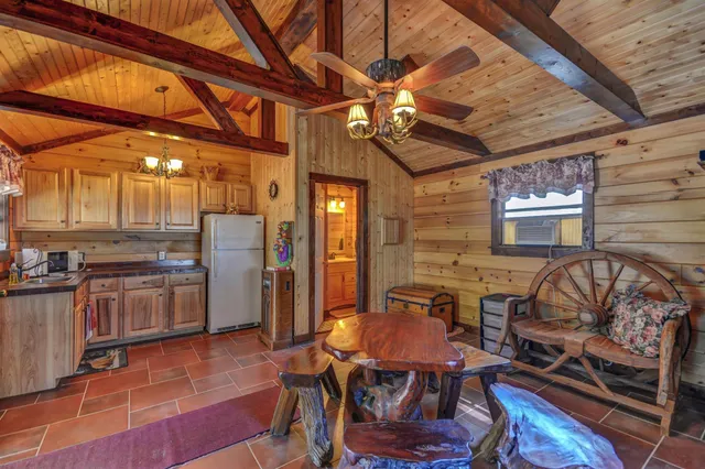 a view of a yard with swimming pool