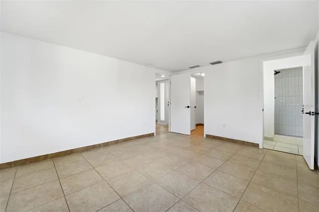 an empty room with an entryway