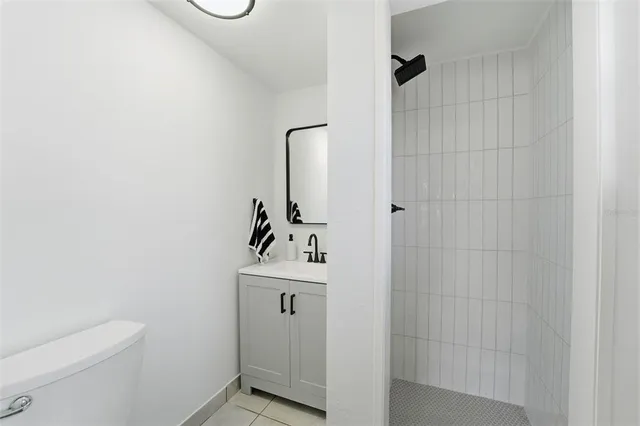 a bathroom with a toilet and a sink