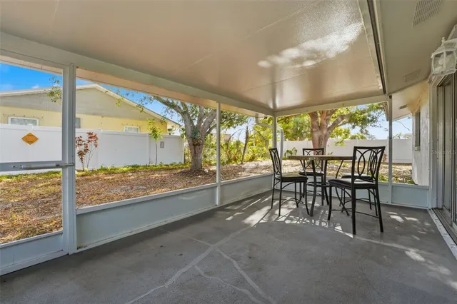a large room with chairs and outdoor view