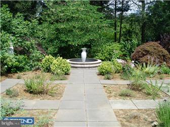 24 Shady Lane Road Clarksboro, NJ 08020 - Photo 3 of 12 a white bench sitting in the middle of a yard