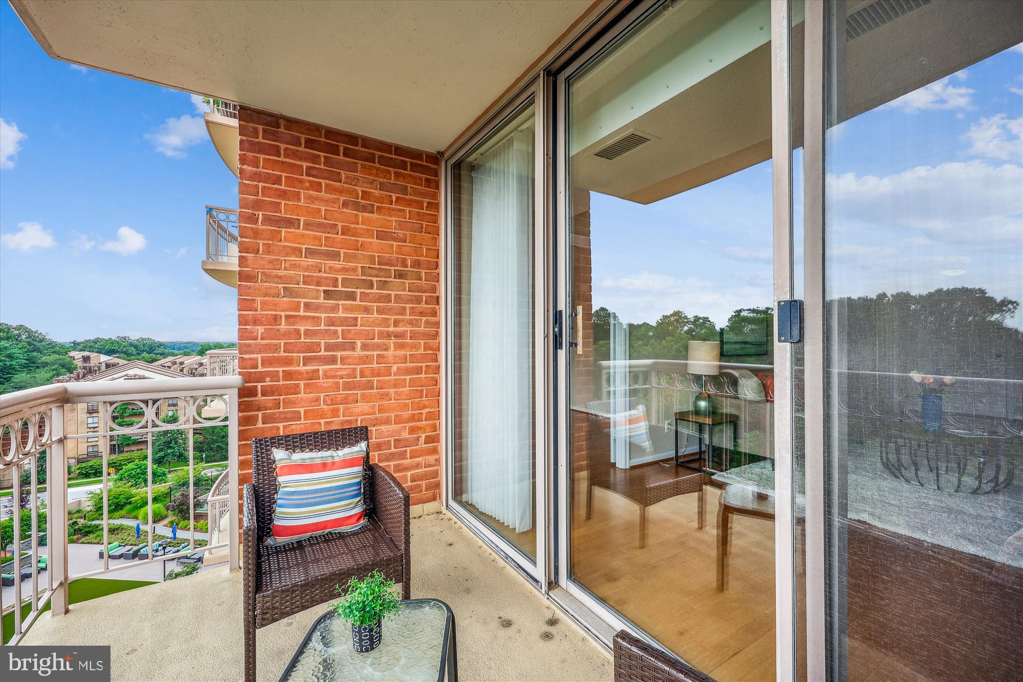 5800 Nicholson Lane, Unit 1908 Rockville, MD 20852 - Photo 19 of 35 a balcony with water view and a potted plant