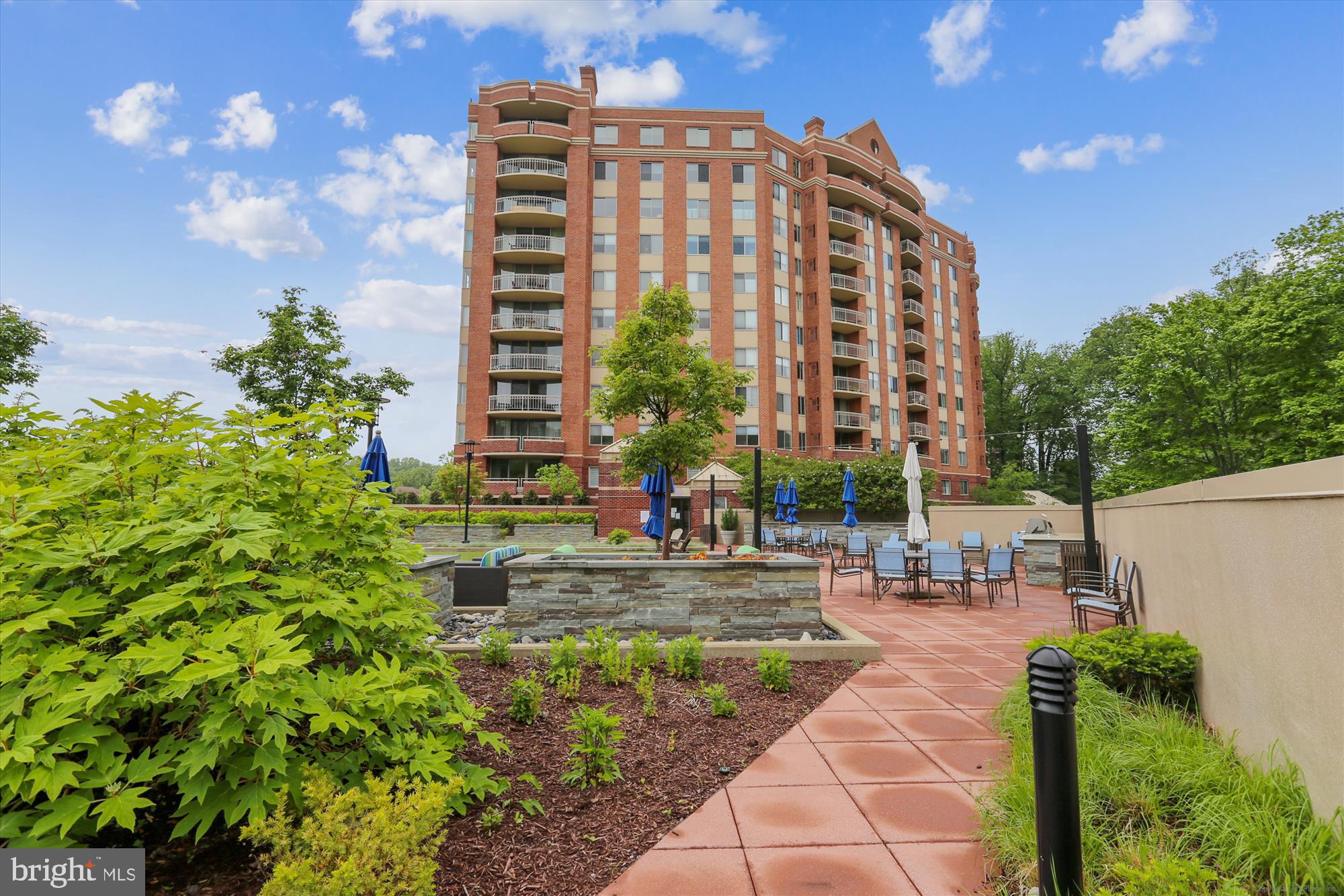 5800 Nicholson Lane, Unit 1908 Rockville, MD 20852 - Photo 22 of 35 a view of a tall building next to a yard