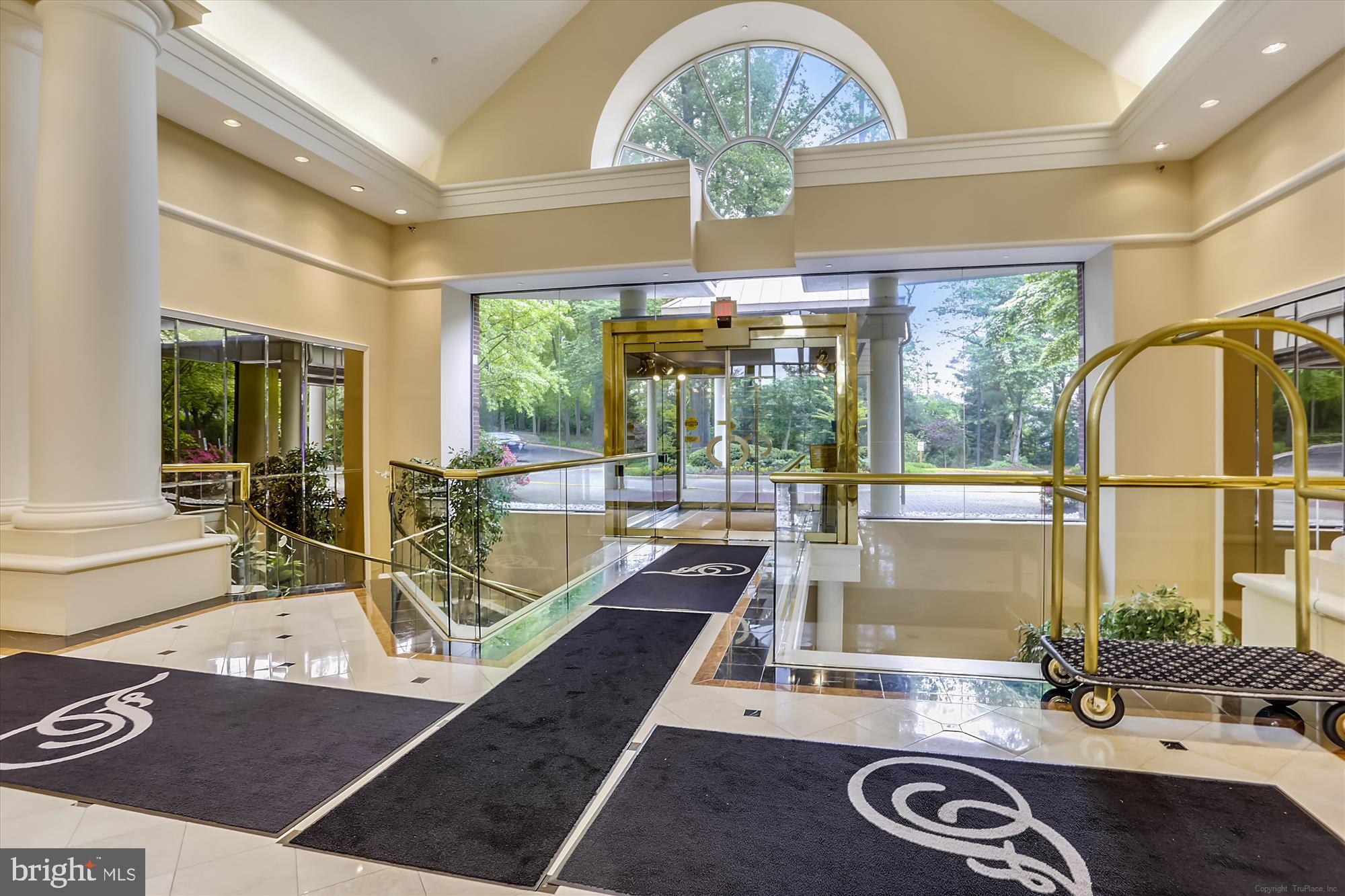 5800 Nicholson Lane, Unit 1908 Rockville, MD 20852 - Photo 28 of 35 a view of a swimming pool with a dining table a chandelier fan and wooden floor