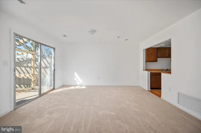 a view of a kitchen with a sink