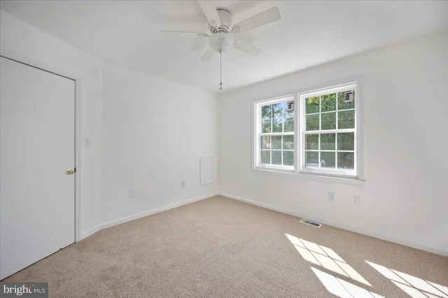 a bathroom with a bathtub and toilet