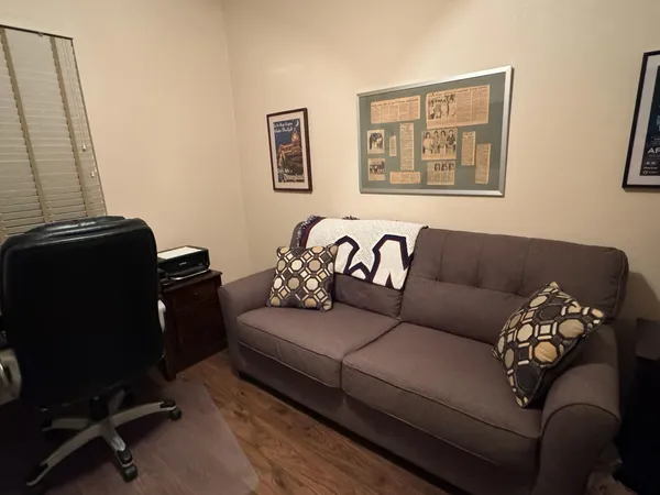 a living room with furniture and a couch