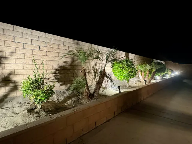 a view of a garden from a balcony