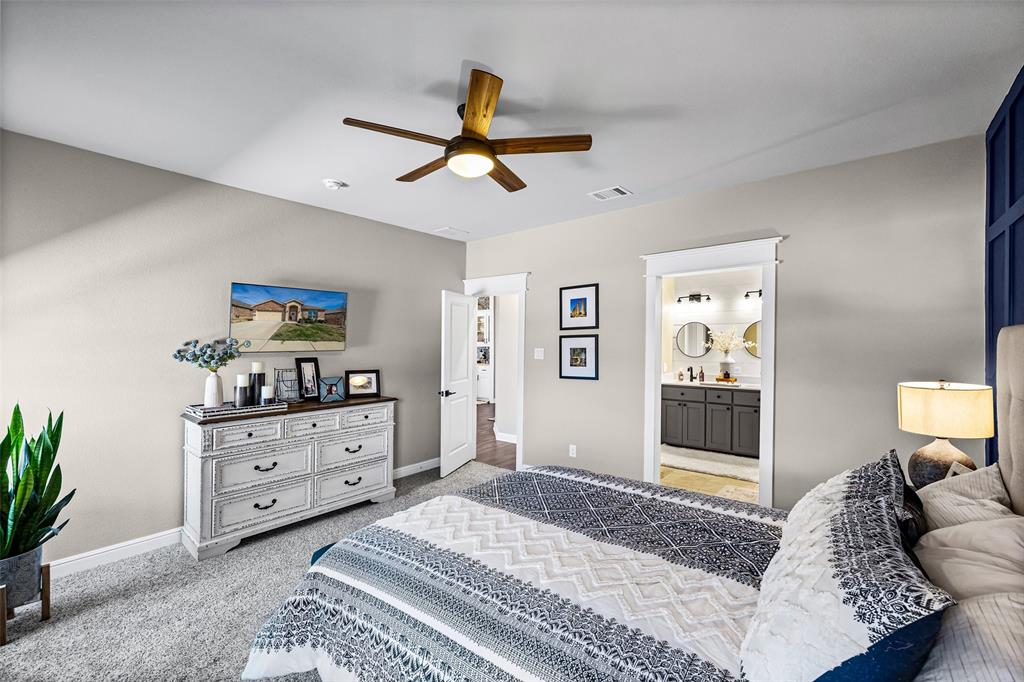 2373 Briscoe Rnch Drive Weatherford, TX 76087 - Photo 17 of 38 a bedroom with a bed and a window