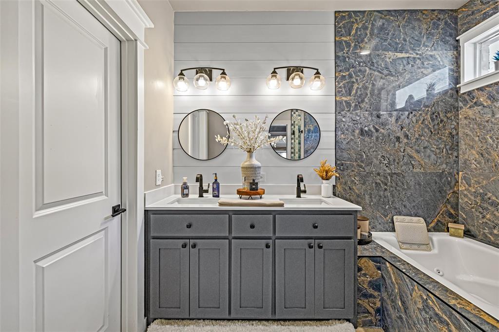 2373 Briscoe Rnch Drive Weatherford, TX 76087 - Photo 19 of 38 a bathroom with a sink and a mirror