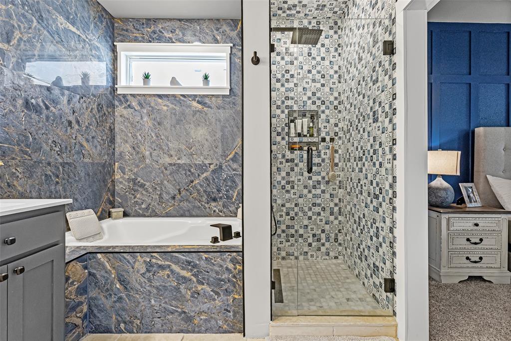 2373 Briscoe Rnch Drive Weatherford, TX 76087 - Photo 20 of 38 a bathroom with a bathtub and a shower