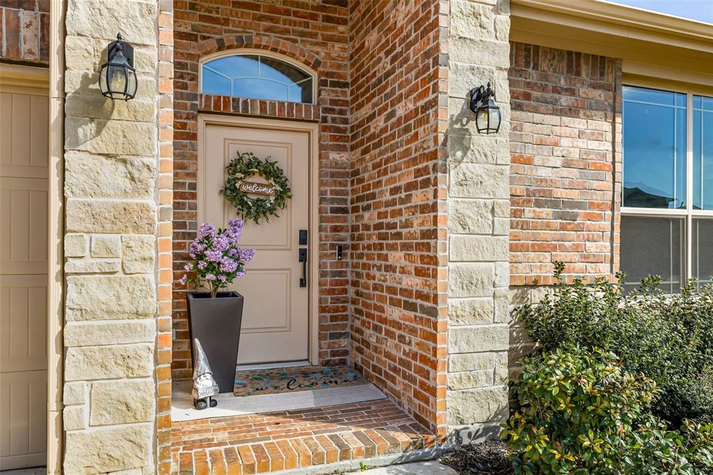 2373 Briscoe Rnch Drive Weatherford, TX 76087 - Photo 4 of 38 a view of a door with a potted plant