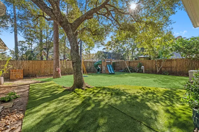 a view of a backyard with a garden
