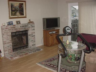 1540 Gretchen Court Rohnert Park, CA 94928 - Photo 3 of 6 Living Room with cozy fireplace.