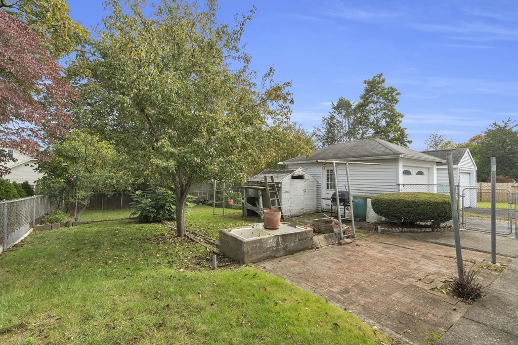 67 Bruce Road Waltham, MA 02453 - Photo 14 of 17 a front view of a house with a yard