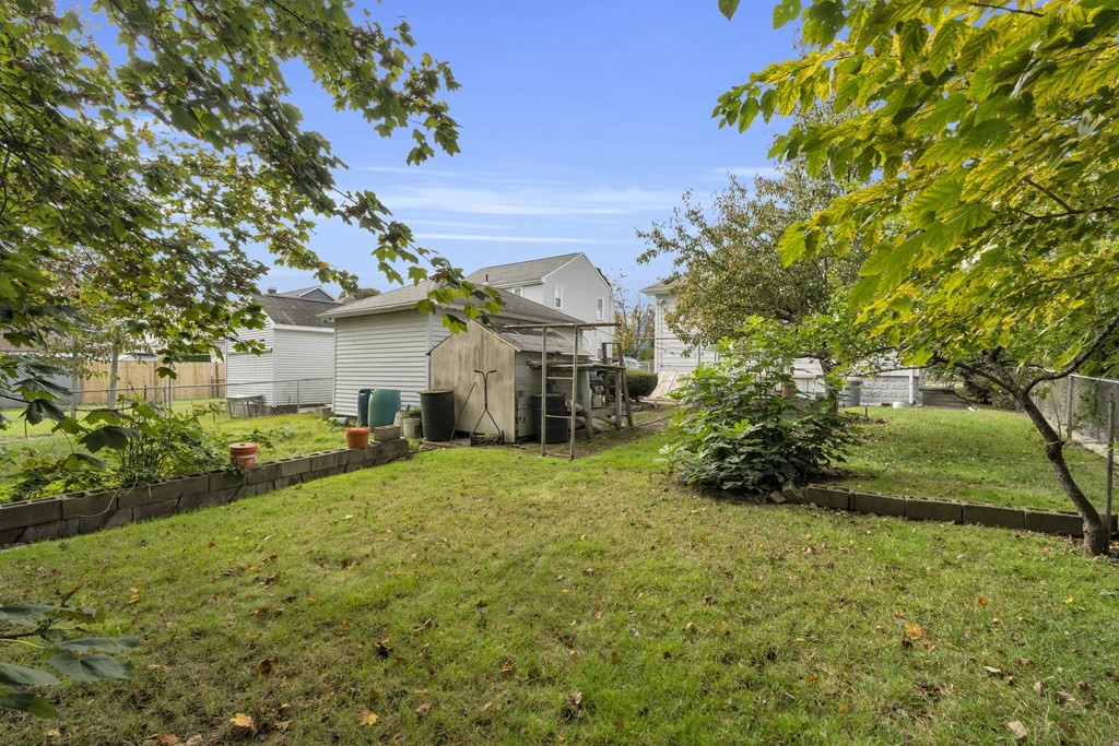 67 Bruce Road Waltham, MA 02453 - Photo 15 of 17 a house view with a garden space