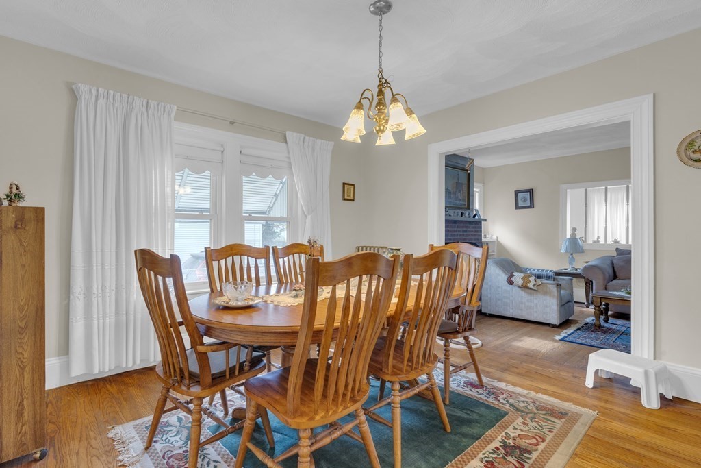 67 Bruce Road Waltham, MA 02453 - Photo 3 of 17 a view of a dining room with furniture and wooden floor