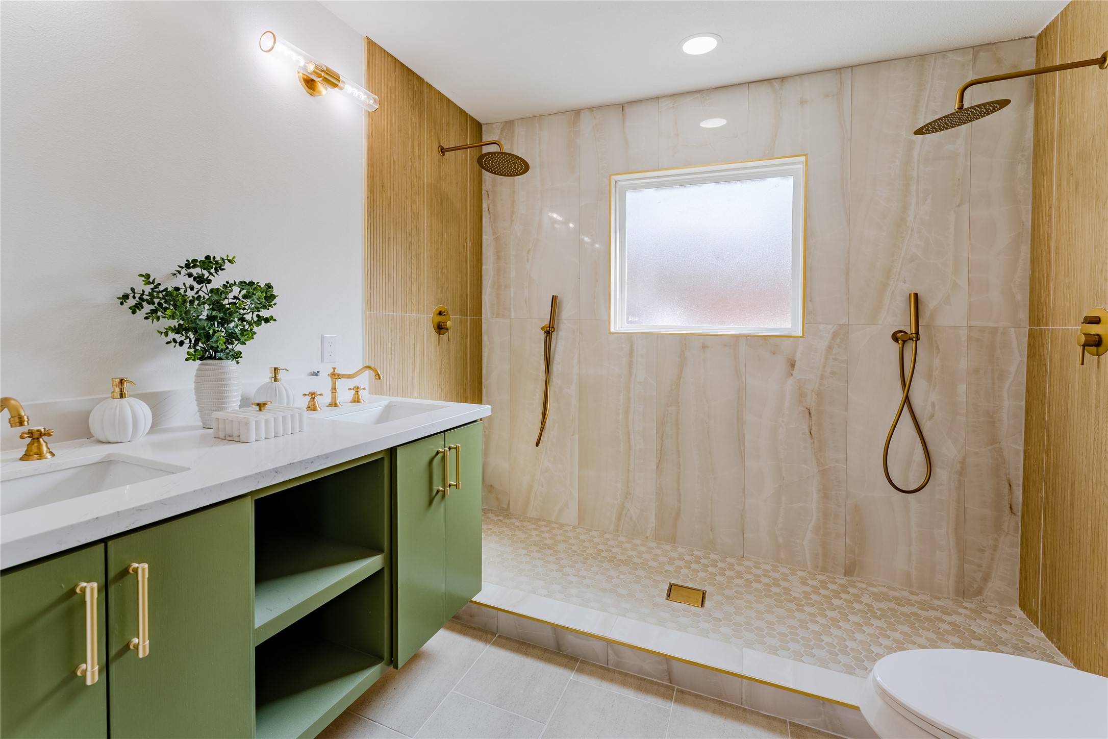 6027 Valkeith Drive Houston, TX 77096 - Photo 20 of 31 a bathroom with a granite countertop sink toilet and shower