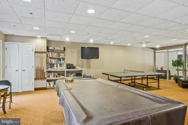 a view of a garden with a house