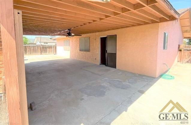 Undisclosed Address Delano, CA 93215 - Photo 12 of 14 a view of a room with a garage
