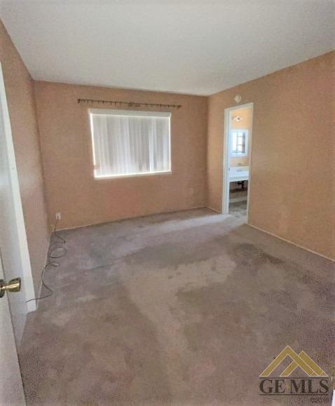 Undisclosed Address Delano, CA 93215 - Photo 5 of 14 an empty room with windows