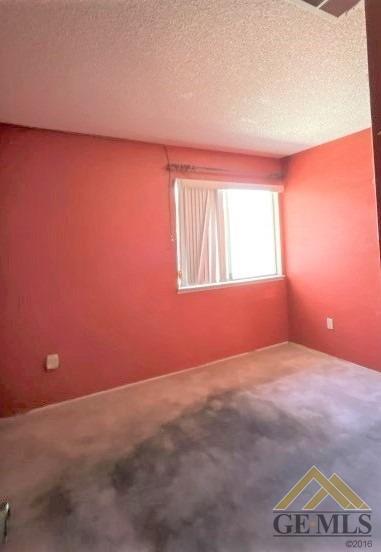 Undisclosed Address Delano, CA 93215 - Photo 7 of 14 an empty room with windows