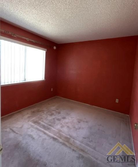 Undisclosed Address Delano, CA 93215 - Photo 10 of 14 an empty room with windows