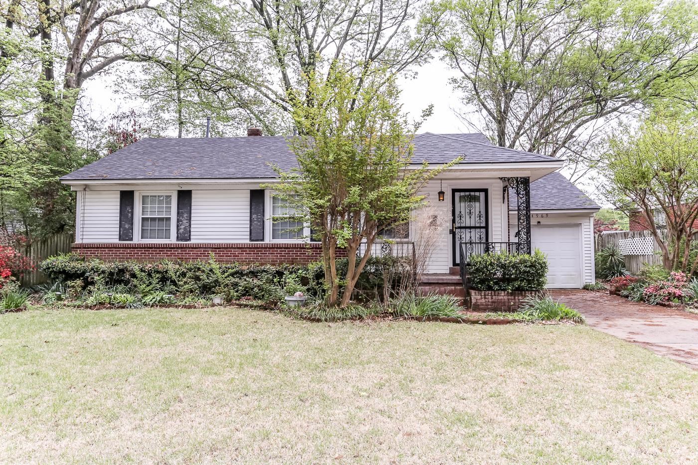 4969 Amboy Road Memphis, TN 38117 - Photo 1 of 19 front view of a house with a yard