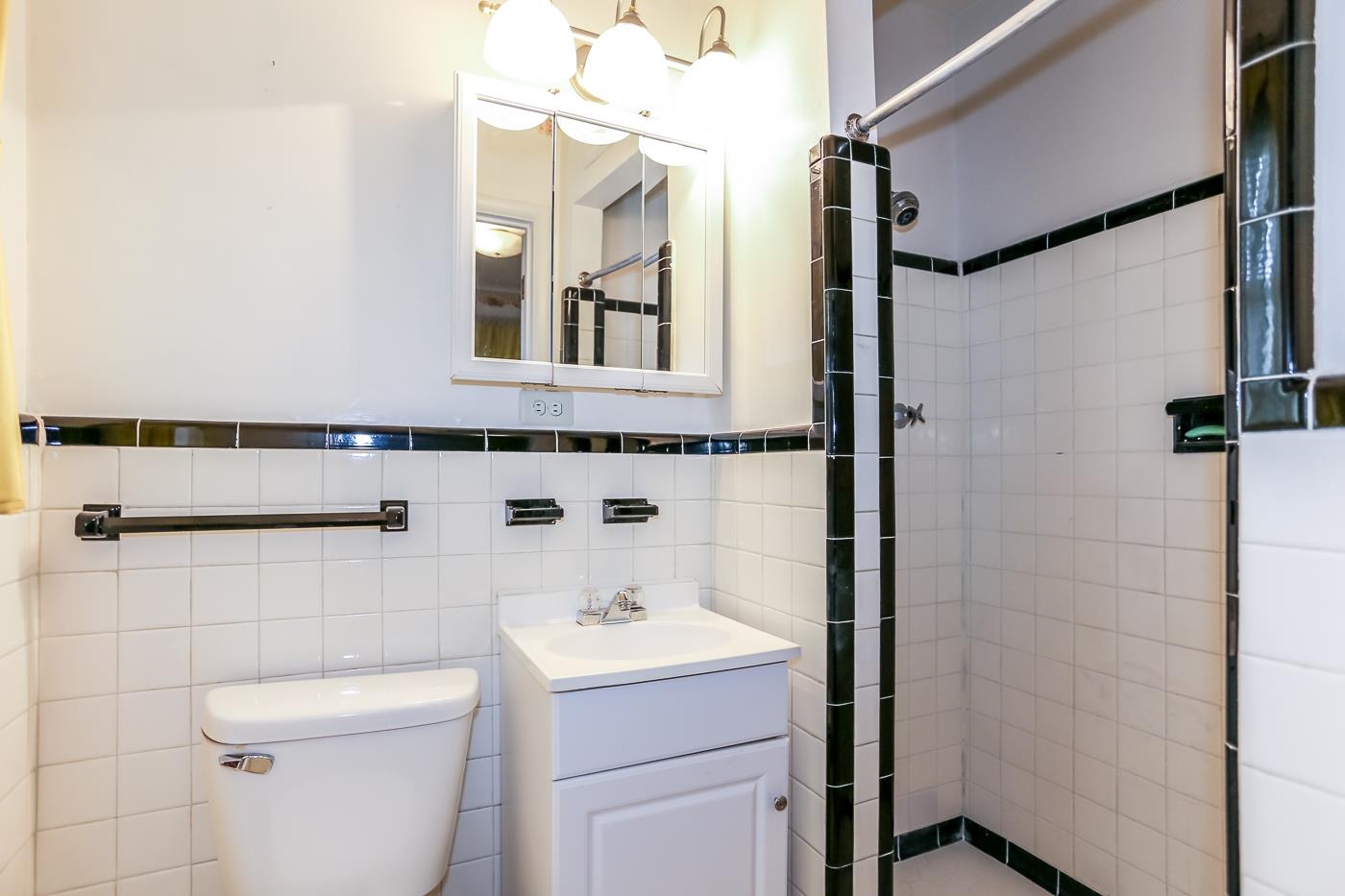 4969 Amboy Road Memphis, TN 38117 - Photo 13 of 19 a bathroom with a sink a toilet and shower