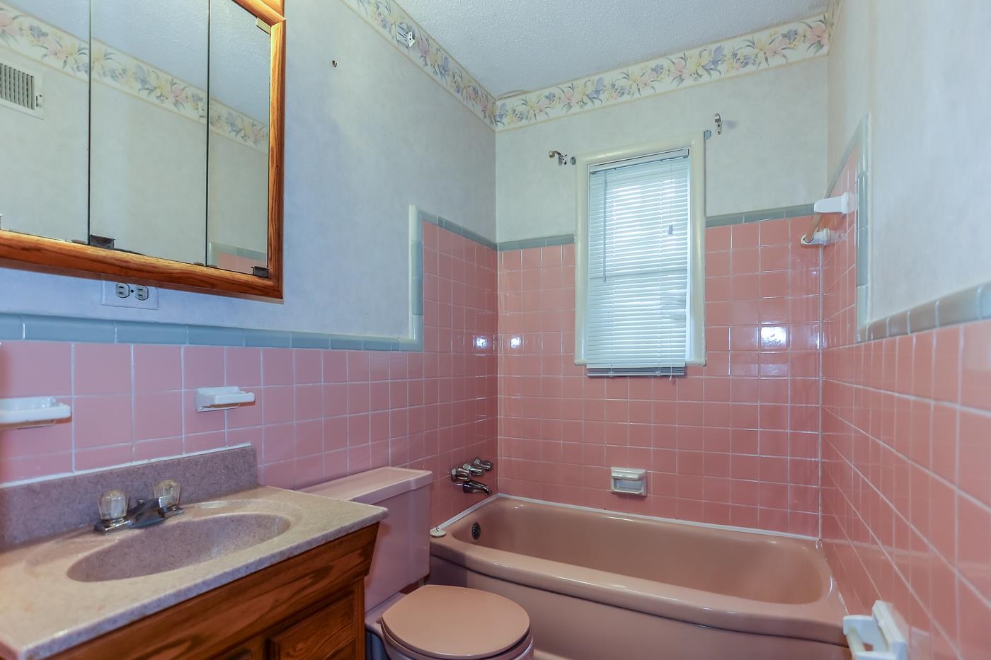 4969 Amboy Road Memphis, TN 38117 - Photo 15 of 19 a bathroom with a sink a toilet and shower