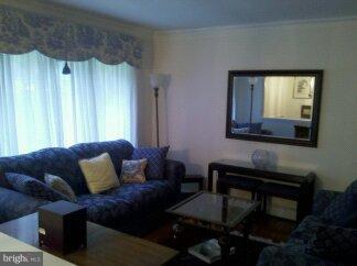 2676 Walston Road Mount Airy, MD 21771 - Photo 2 of 28 a living room with furniture and a window