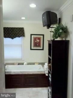 2676 Walston Road Mount Airy, MD 21771 - Photo 11 of 28 a bathroom with a sink and a mirror