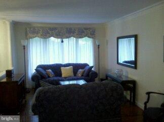 2676 Walston Road Mount Airy, MD 21771 - Photo 16 of 28 a living room with furniture and a window