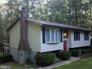 2676 Walston Road Mount Airy, MD 21771 - Photo 28 of 28 a view of house with a yard and potted plants