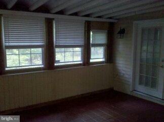 2676 Walston Road Mount Airy, MD 21771 - Photo 5 of 28 a view of an empty room with a window