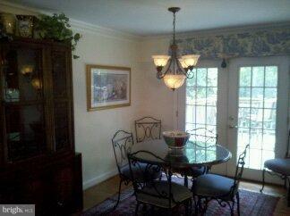 2676 Walston Road Mount Airy, MD 21771 - Photo 7 of 28 a dining room with furniture and window