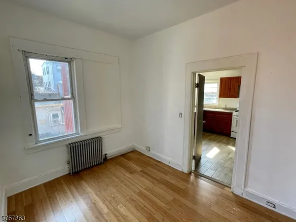 wooden floor and window in a room