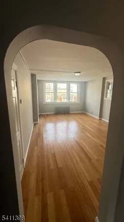 a view of livingroom and hardwood