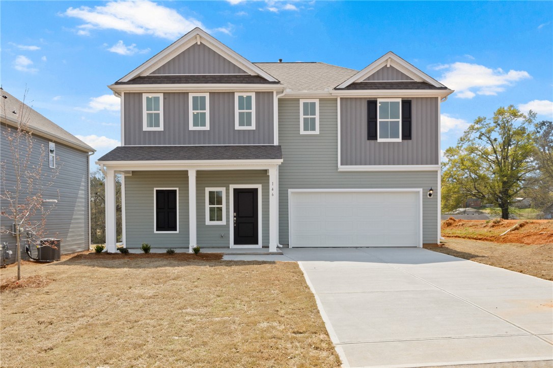 146 Cedar Shoals Easley, SC 29640 - Photo 1 of 34 This modern home features a welcoming porch, a two-car garage, and ample yard space.