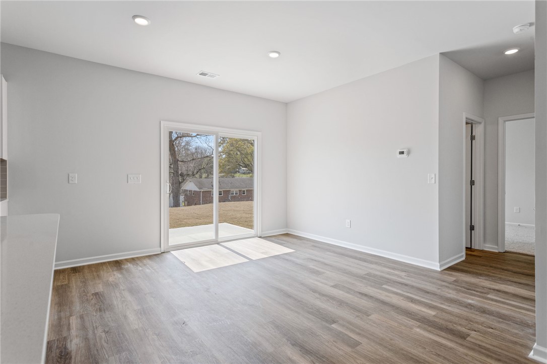 146 Cedar Shoals Easley, SC 29640 - Photo 13 of 34 This bright room features a large glass sliding door leading to the outdoors.