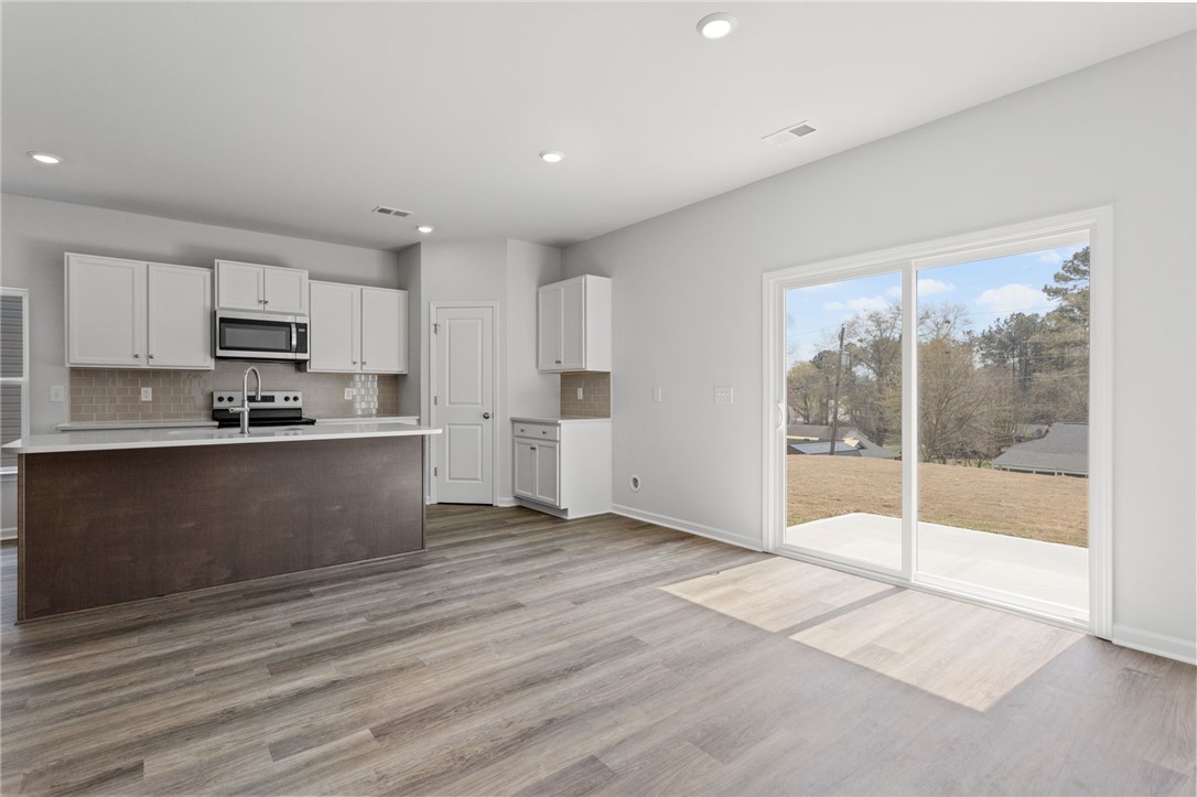 146 Cedar Shoals Easley, SC 29640 - Photo 14 of 34 This bright kitchen with ample natural light provides a functional and inviting space.