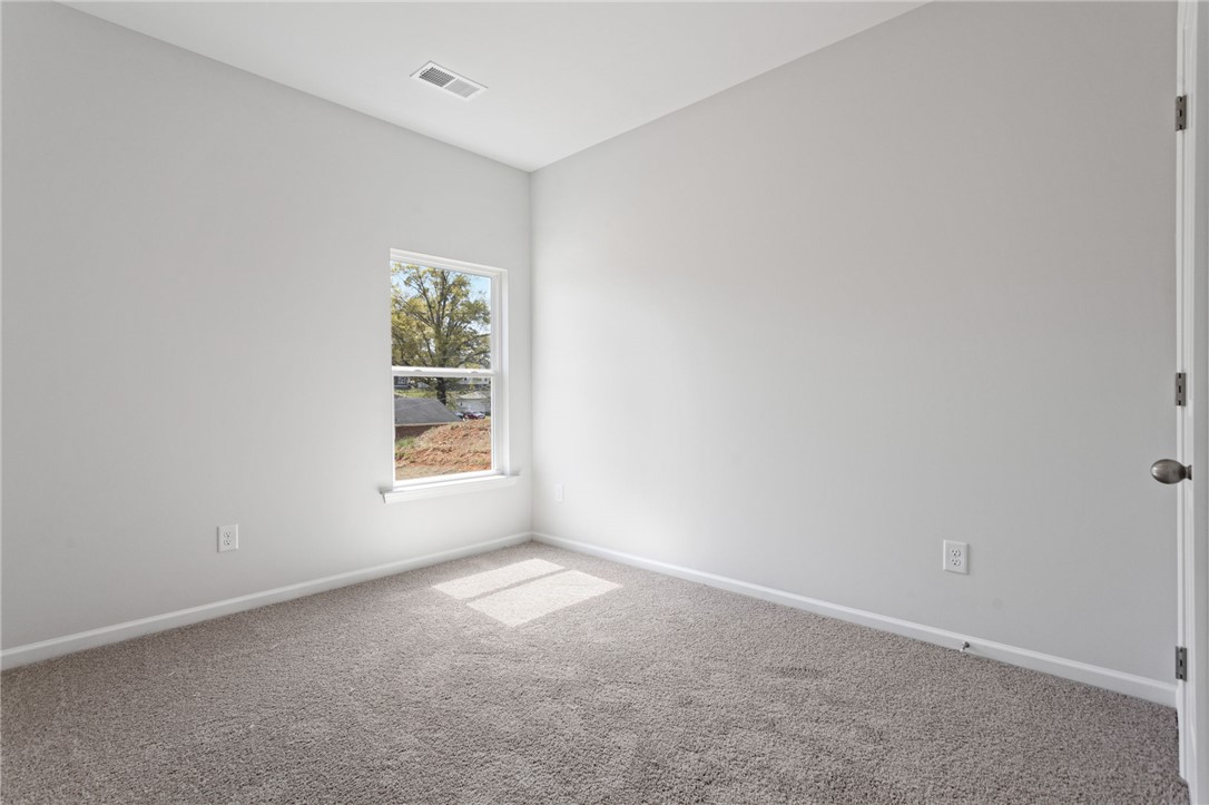146 Cedar Shoals Easley, SC 29640 - Photo 16 of 34 This bright and airy room offers a tranquil retreat with ample natural light.