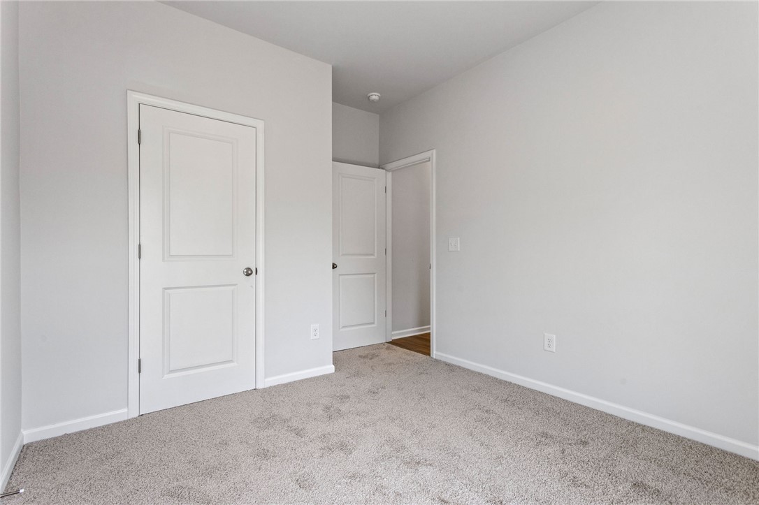 146 Cedar Shoals Easley, SC 29640 - Photo 17 of 34 This spacious room provides a blank canvas for personalization, offering comfort and flexibility for any design vision.