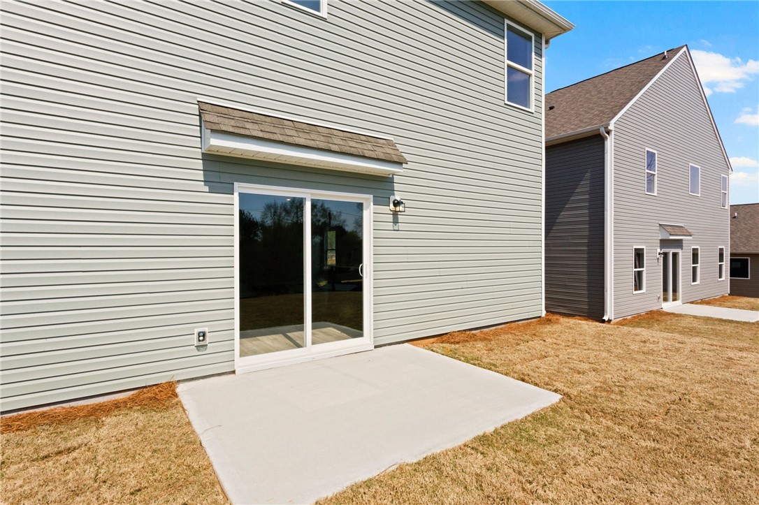 146 Cedar Shoals Easley, SC 29640 - Photo 32 of 34 This newly constructed property features a private patio perfect for outdoor enjoyment.