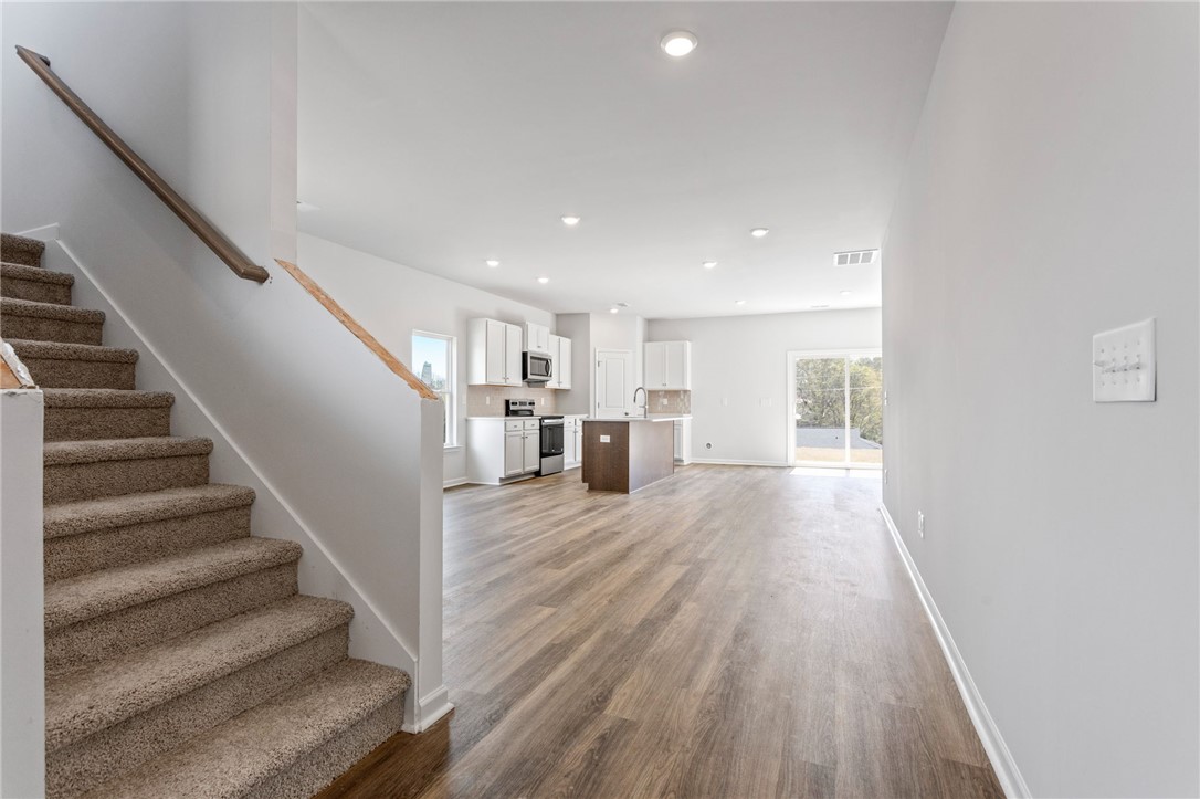 146 Cedar Shoals Easley, SC 29640 - Photo 4 of 34 This bright and airy open-concept space features contemporary finishes and abundant natural light.