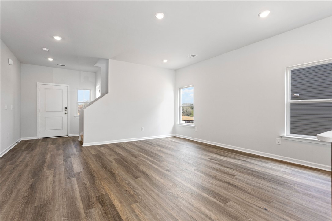 146 Cedar Shoals Easley, SC 29640 - Photo 7 of 34 This bright and airy interior features ample natural light and seamless transitions between living spaces.