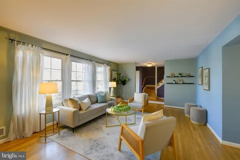 a kitchen that has a sink and a stove in it