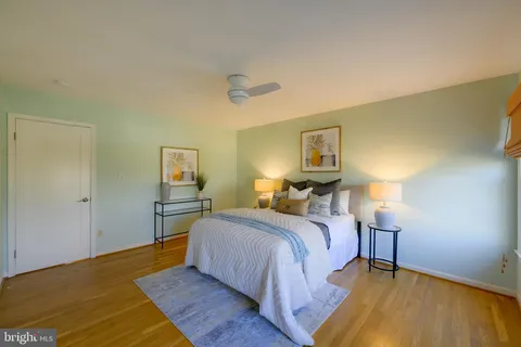 a view of a pathway of a building next to a yard