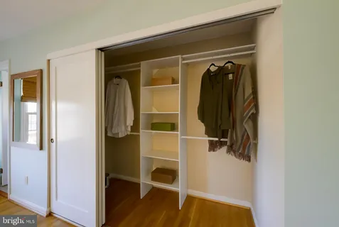 a view of a house with a flower garden