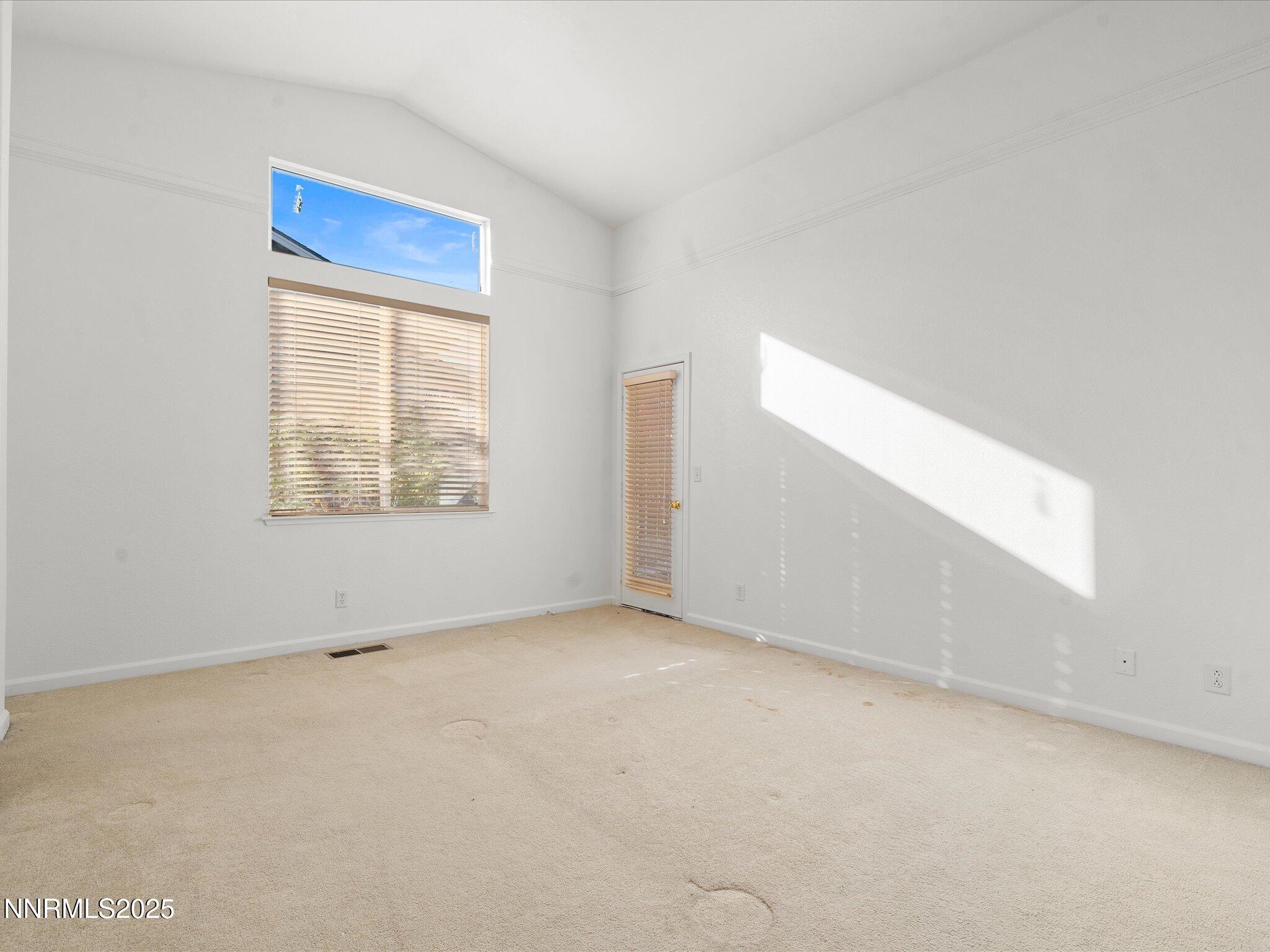 805 Sauvignon Drive Reno, NV 89506 - Photo 21 of 56 an empty room with windows
